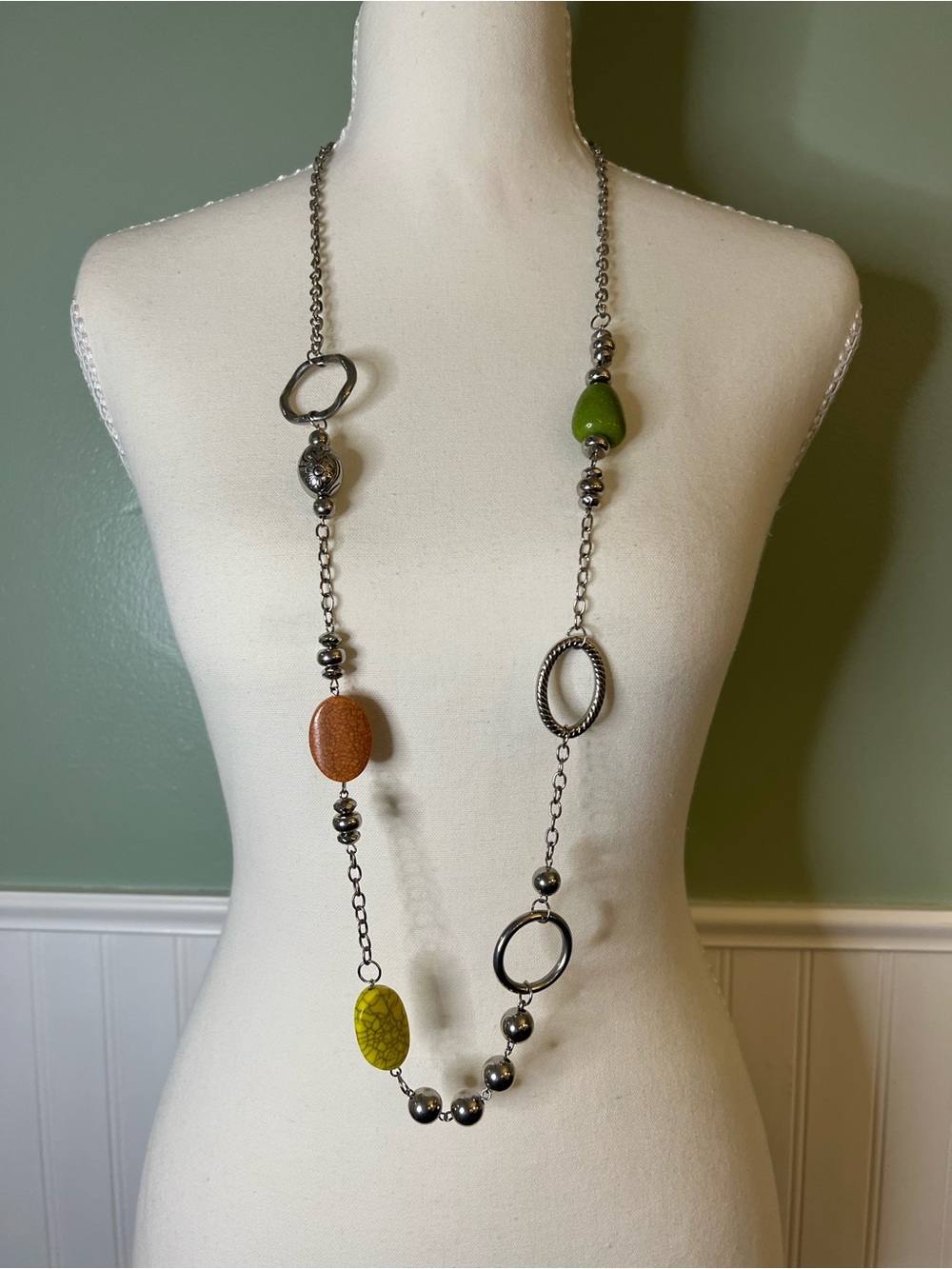 Long Silver-Link Necklace with Green, Yellow and Brown Accent Beads.